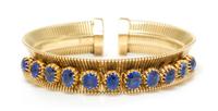 A Retro Yellow Gold and Sapphire Cuff Bracelet, Forstner, 23.90 dwts.