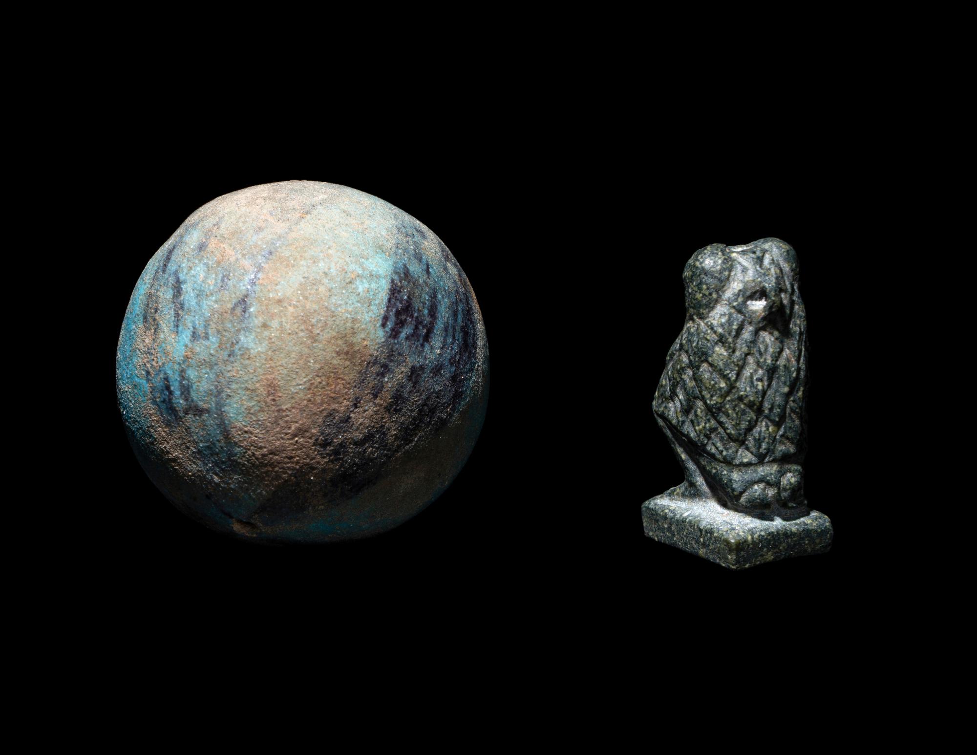 An Egyptian Steatite Baboon and a Bichrome Faience Ball Bead