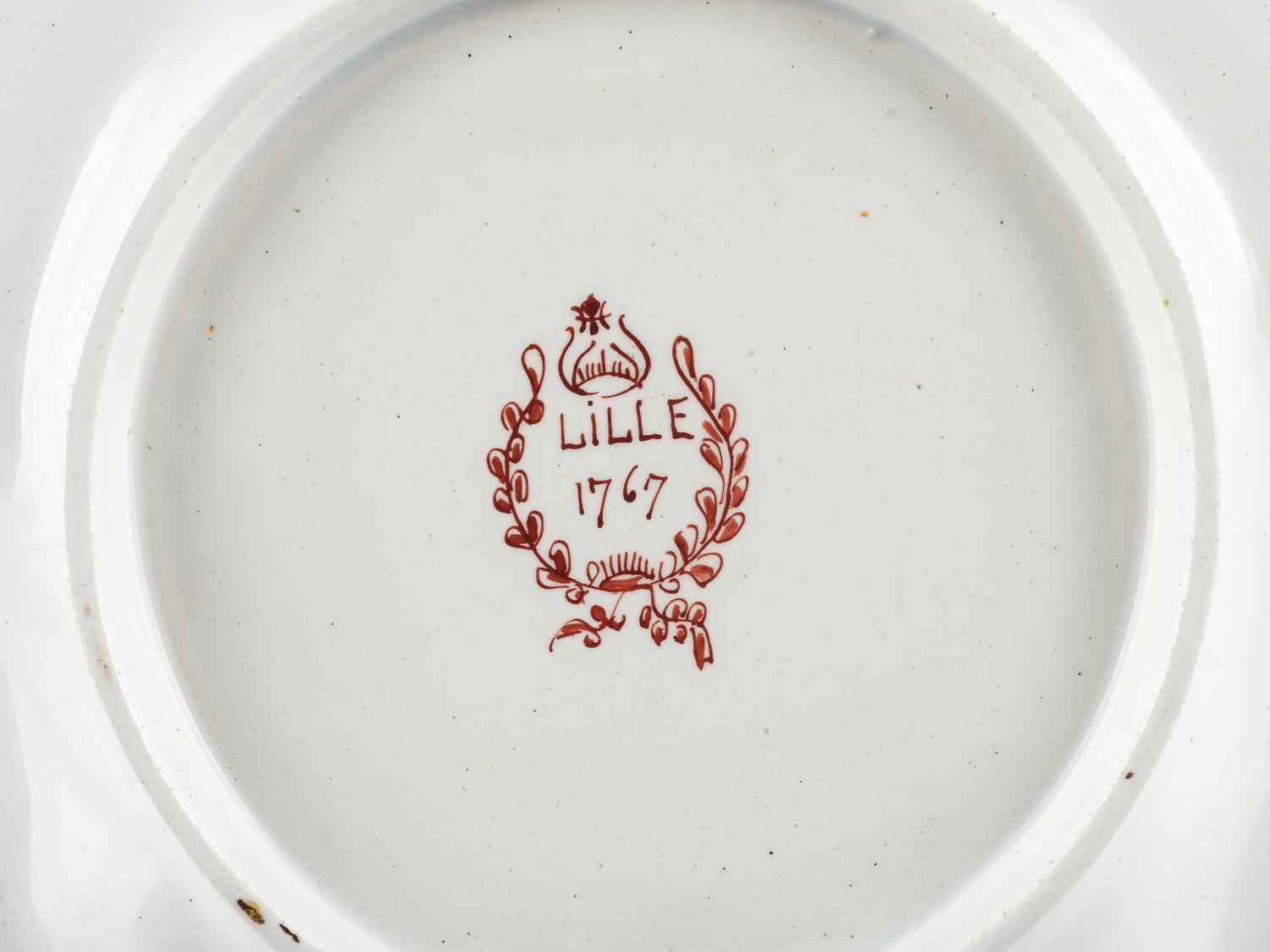 A Pair of French Faience Shield Form Plates