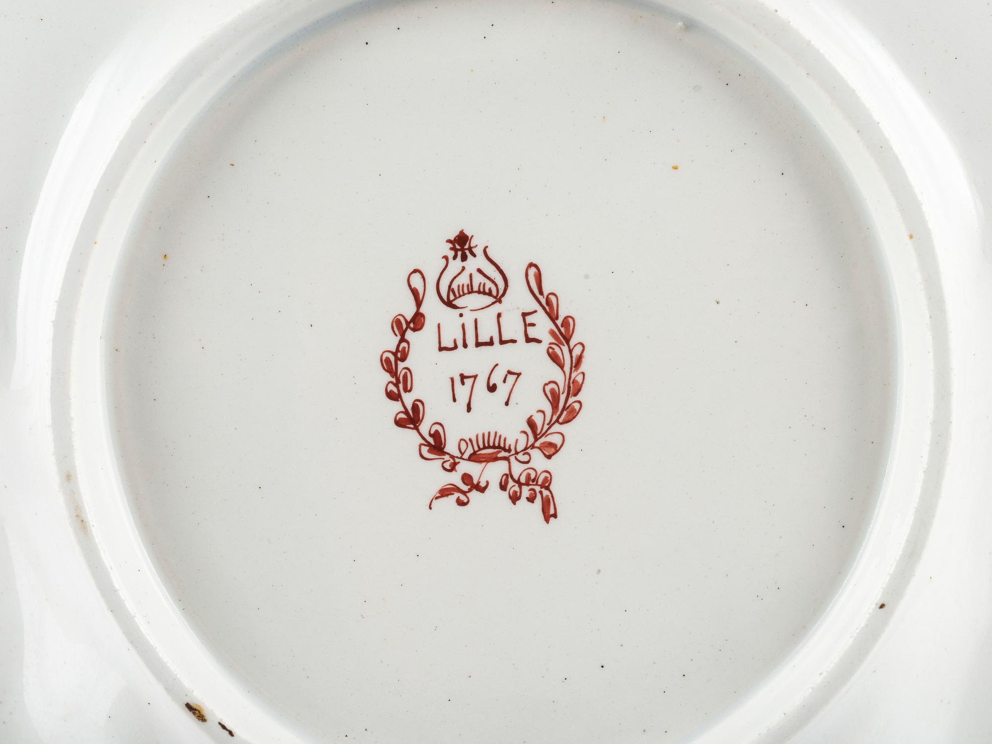 A Pair of French Faience Shield Form Plates