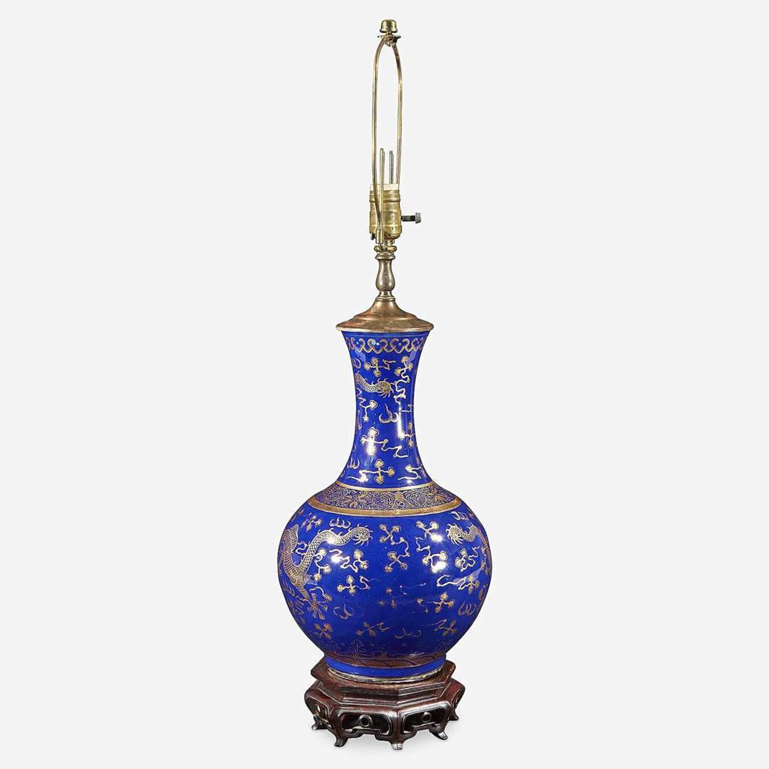 A Chinese gilt-decorated cobalt blue porcelain “Dragon” bottle vase, mounted as a lamp