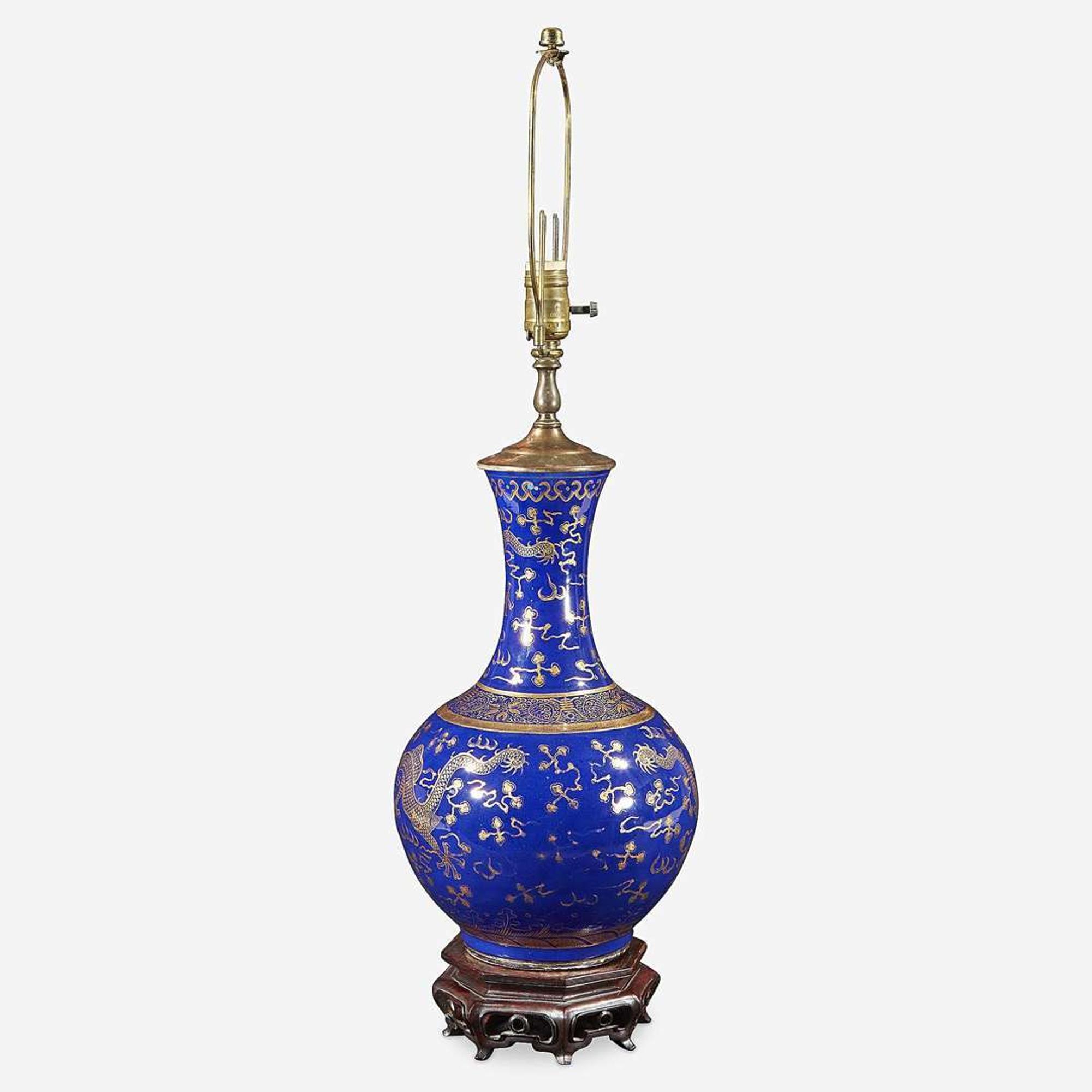 A Chinese gilt-decorated cobalt blue porcelain “Dragon” bottle vase, mounted as a lamp