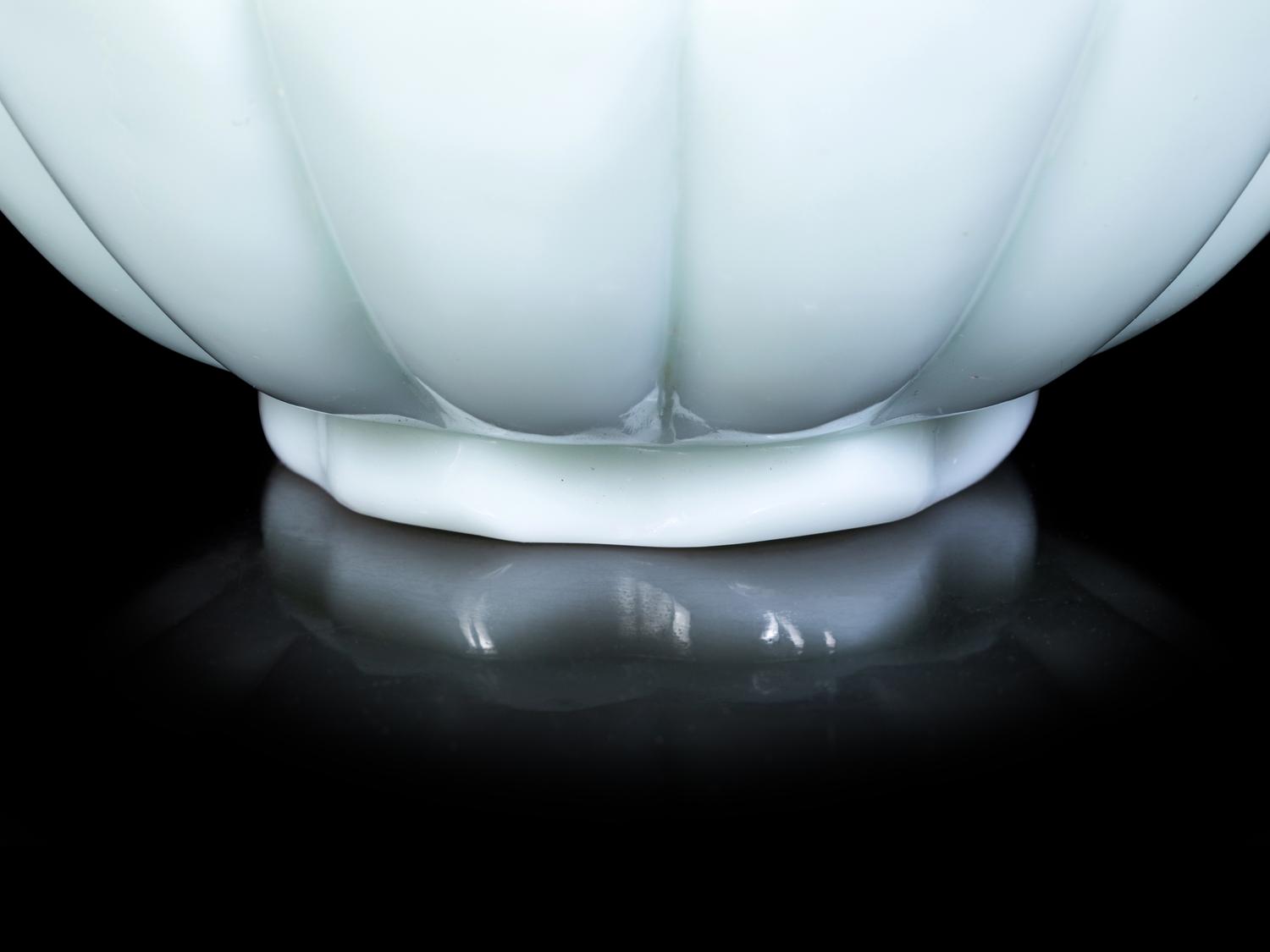 A Pair of Chinese Celadon Glass 'Lotus' Bowls
