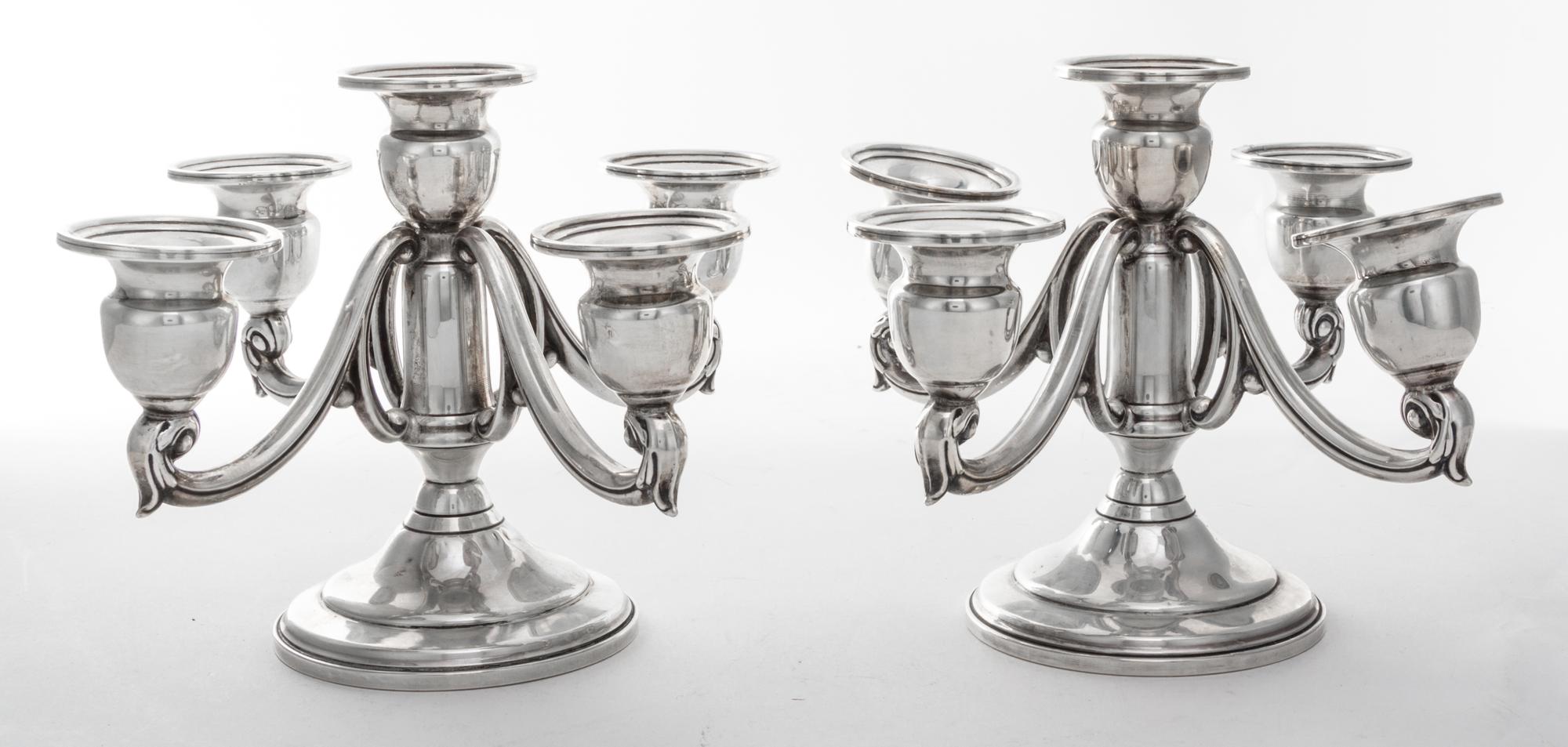 A Pair of American Silver Five-Light Candelabra, Mueck-Carey Co., New York, NY, having a trumpet form base, the cups of baluster form,