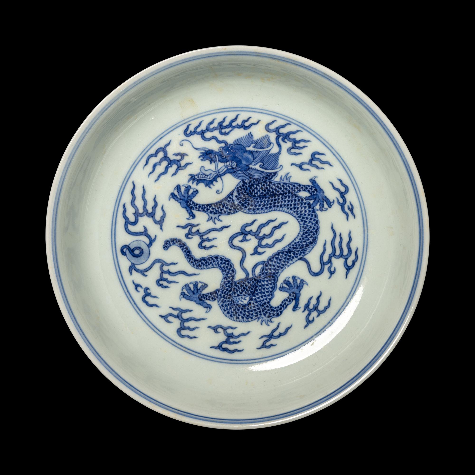 A Chinese Blue and White Porcelain 'Dragon' Plate, Jiaqing Mark and Possibly of the Period 或爲清嘉慶 青花龍戲珠賞盤