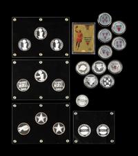 A Group of over 20 One Troy Ounce Silver Medallion 1990s Sports Coins (Including Multiple Chicago Bulls Championship Issues),