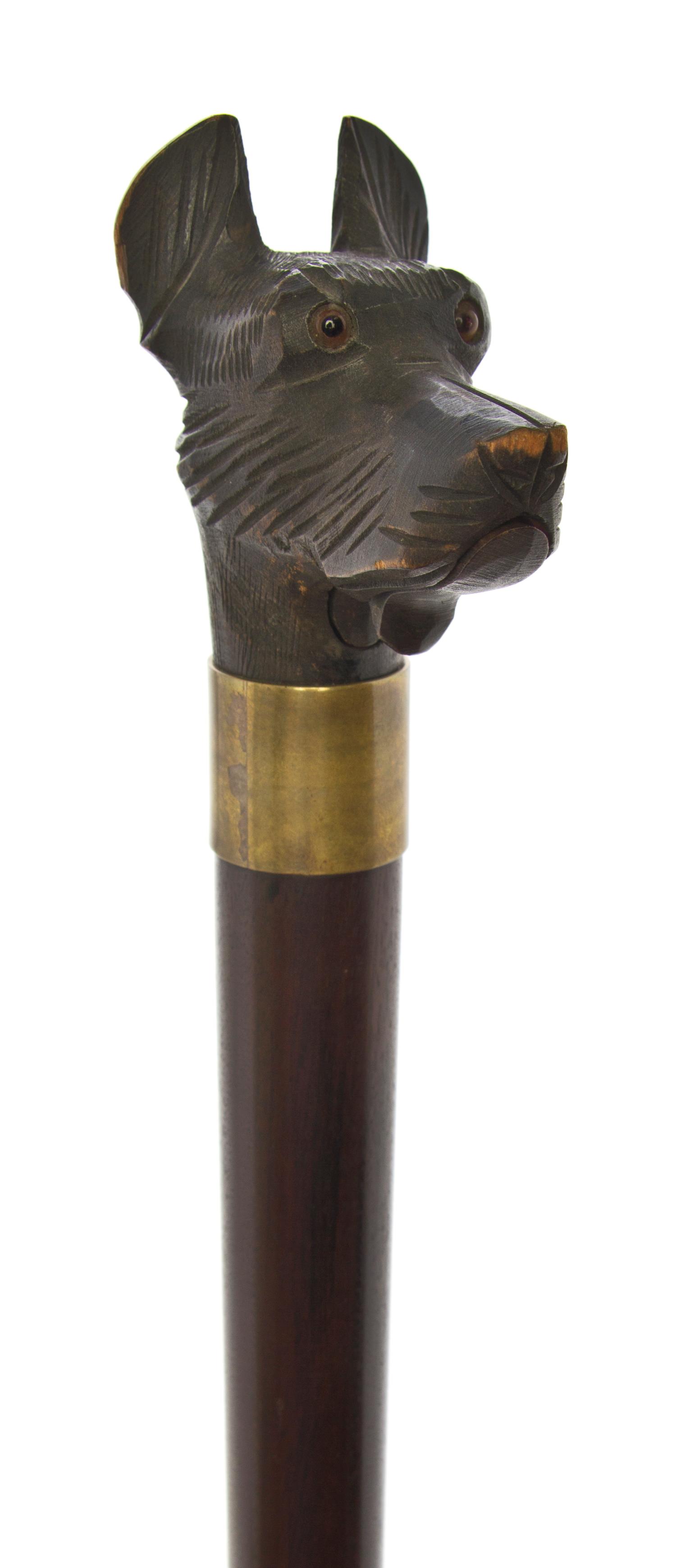 An American Wood Handled Cane, Length of handle 3 x length overall 37 1/4 inches.
