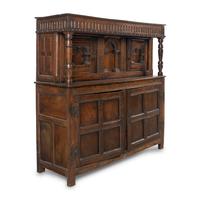 A Jacobean Carved Oak Court Cupboard