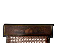 A Classical Carved, Painted and Parcel Gilt Wood Cane Seat Hitchcock Armchair