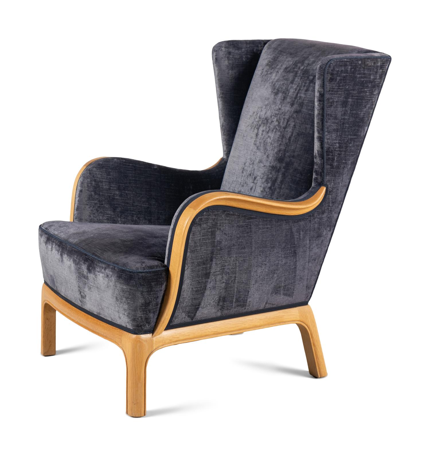 A Contemporary Velvet Upholstered Wing Chair