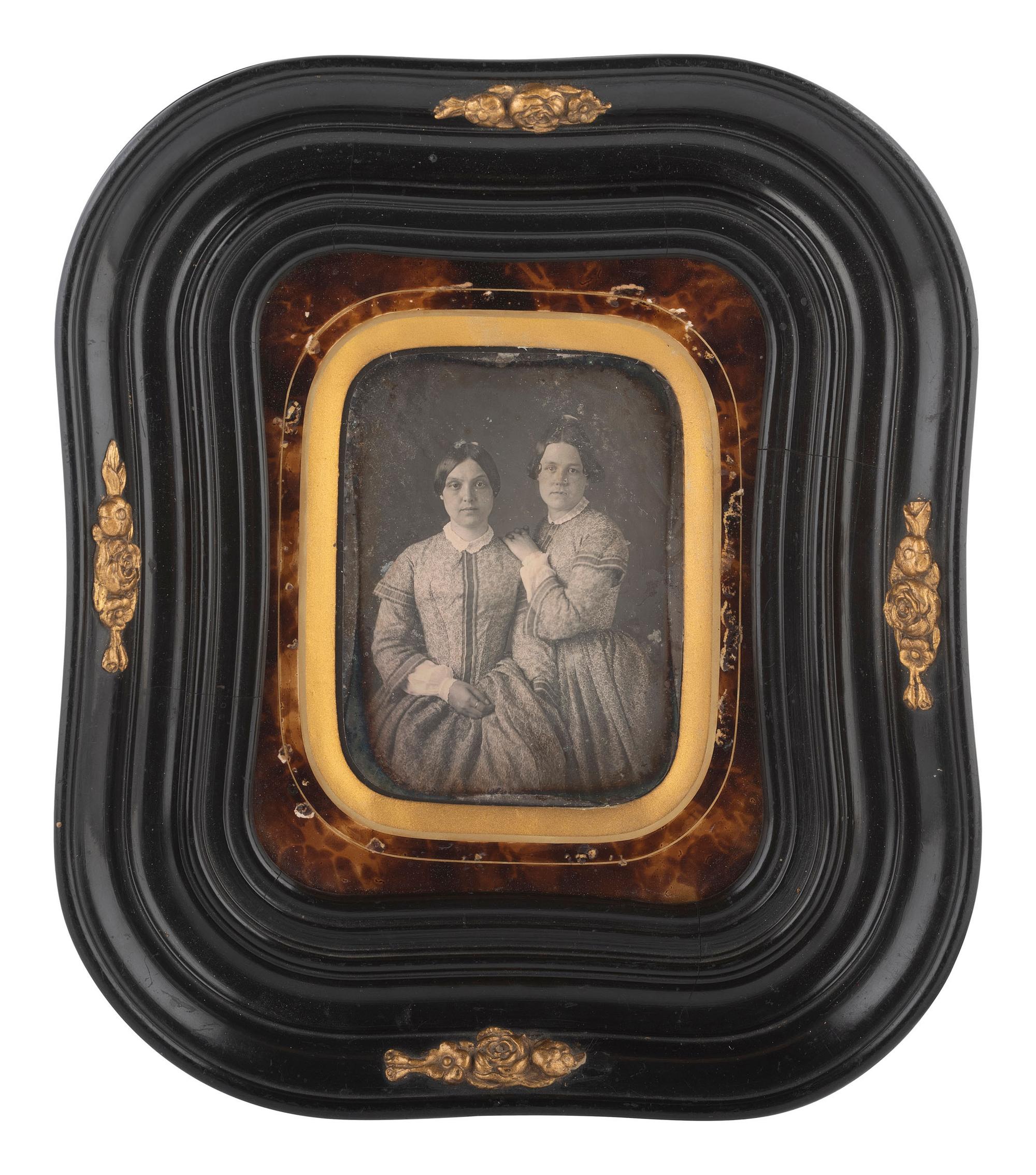 [EARLY PHOTOG]. 15 cased images of siblings, incl. half plate daguerreotype of women in wall frame.