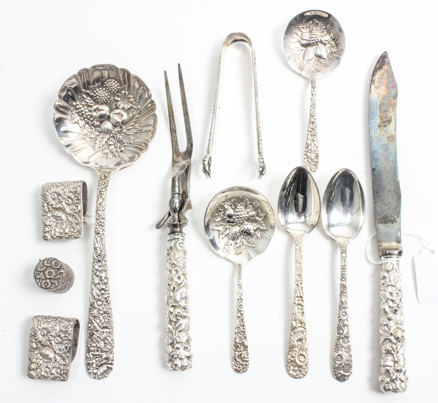 A Group of American Silver Flatware Articles, various makers, comprising 10 teaspoons, 5 olive picks, 2 jelly spoons, 2 table cloth cli