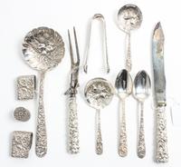 A Group of American Silver Flatware Articles, various makers, comprising 10 teaspoons, 5 olive picks, 2 jelly spoons, 2 table cloth cli