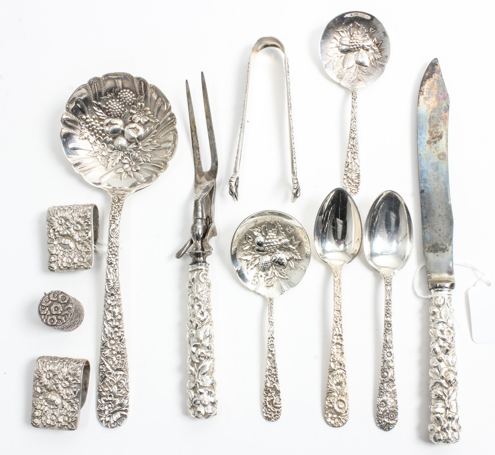 A Group of American Silver Flatware Articles, various makers, comprising 10 teaspoons, 5 olive picks, 2 jelly spoons, 2 table cloth cli