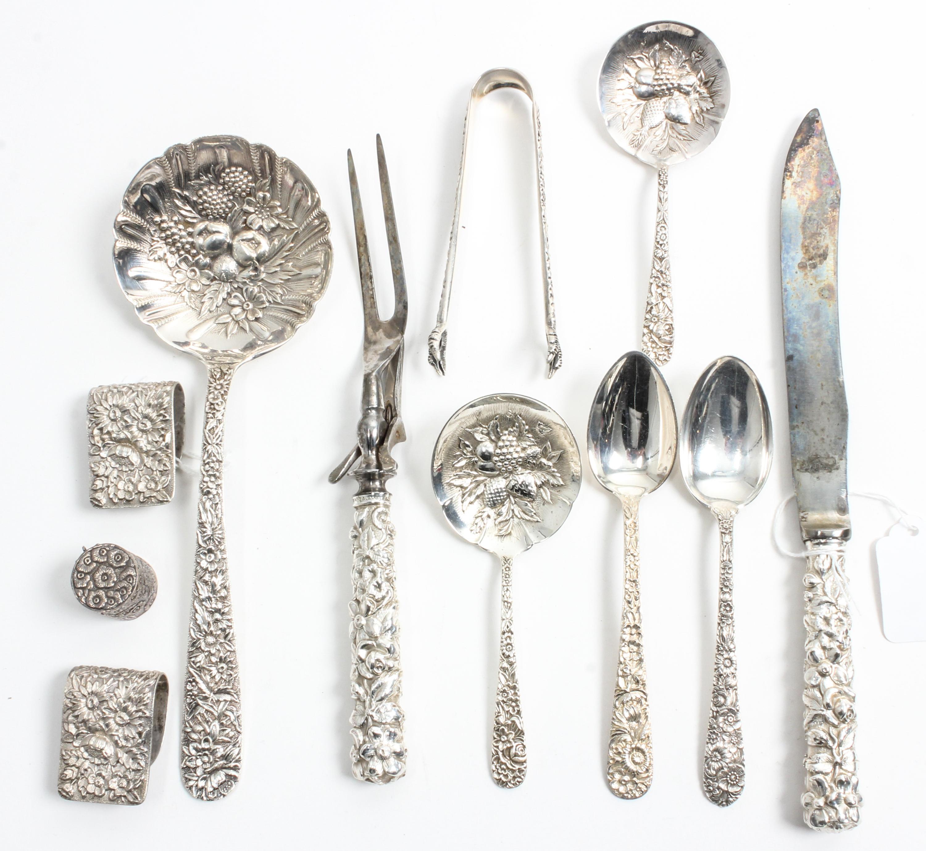A Group of American Silver Flatware Articles, various makers, comprising 10 teaspoons, 5 olive picks, 2 jelly spoons, 2 table cloth cli