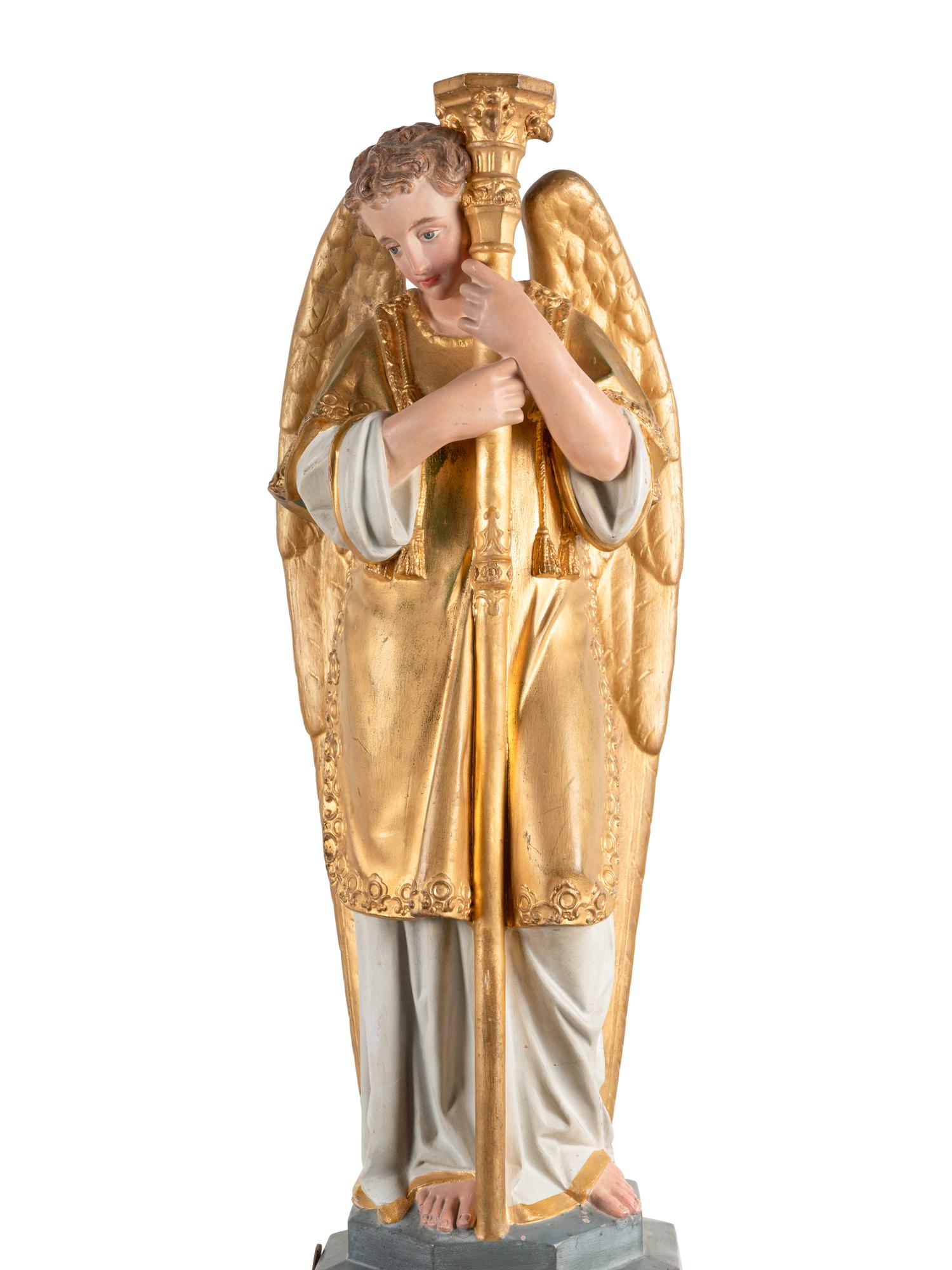 A Pair of Painted and Parcel Gilt Figural Altar Prickets with Associated Gothic Revival Pedestals