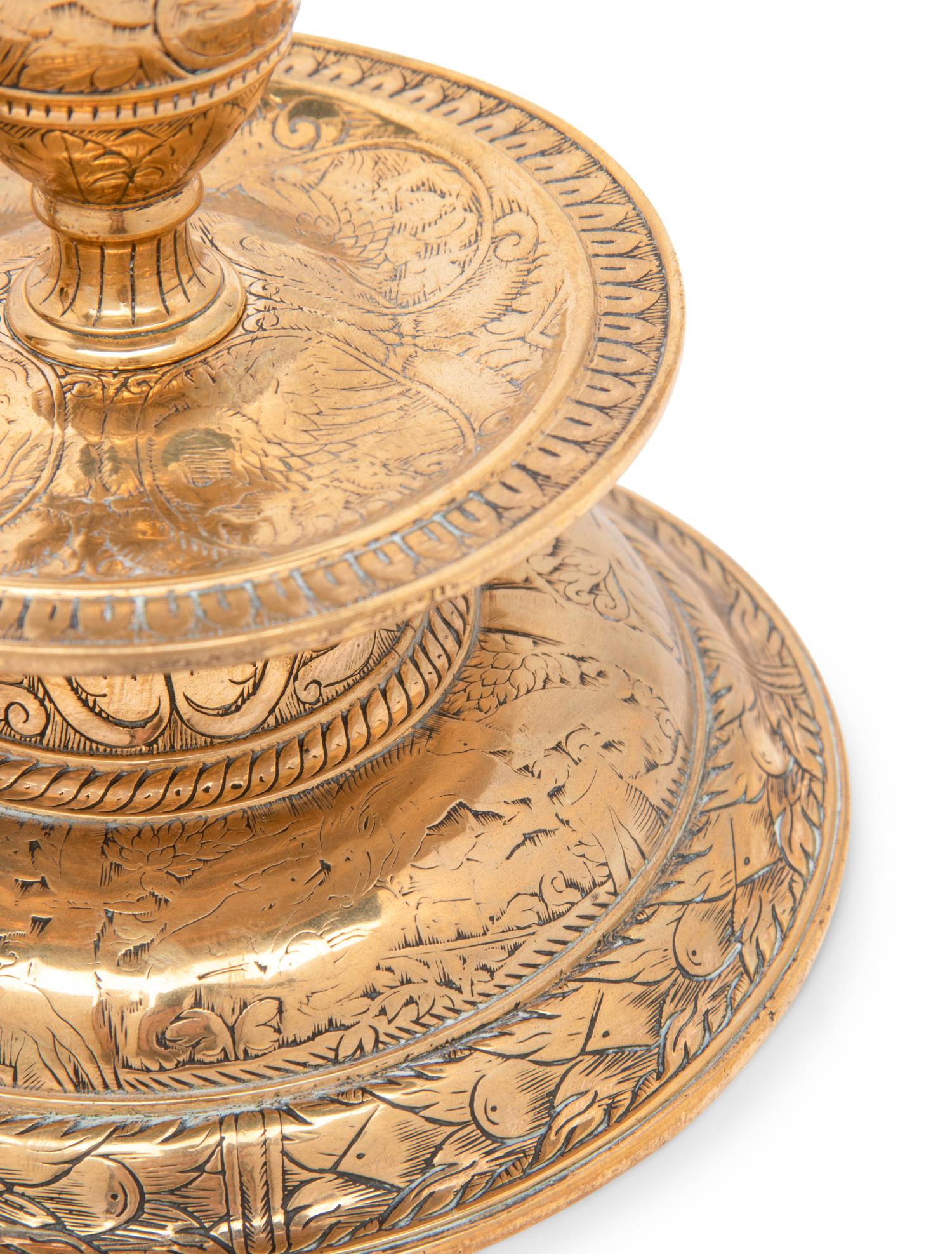 A Pair of Venetian Gilt Bronze Candlesticks