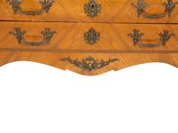 A Régence Style Gilt Metal Mounted Breche d'Alep Marble Top Commode