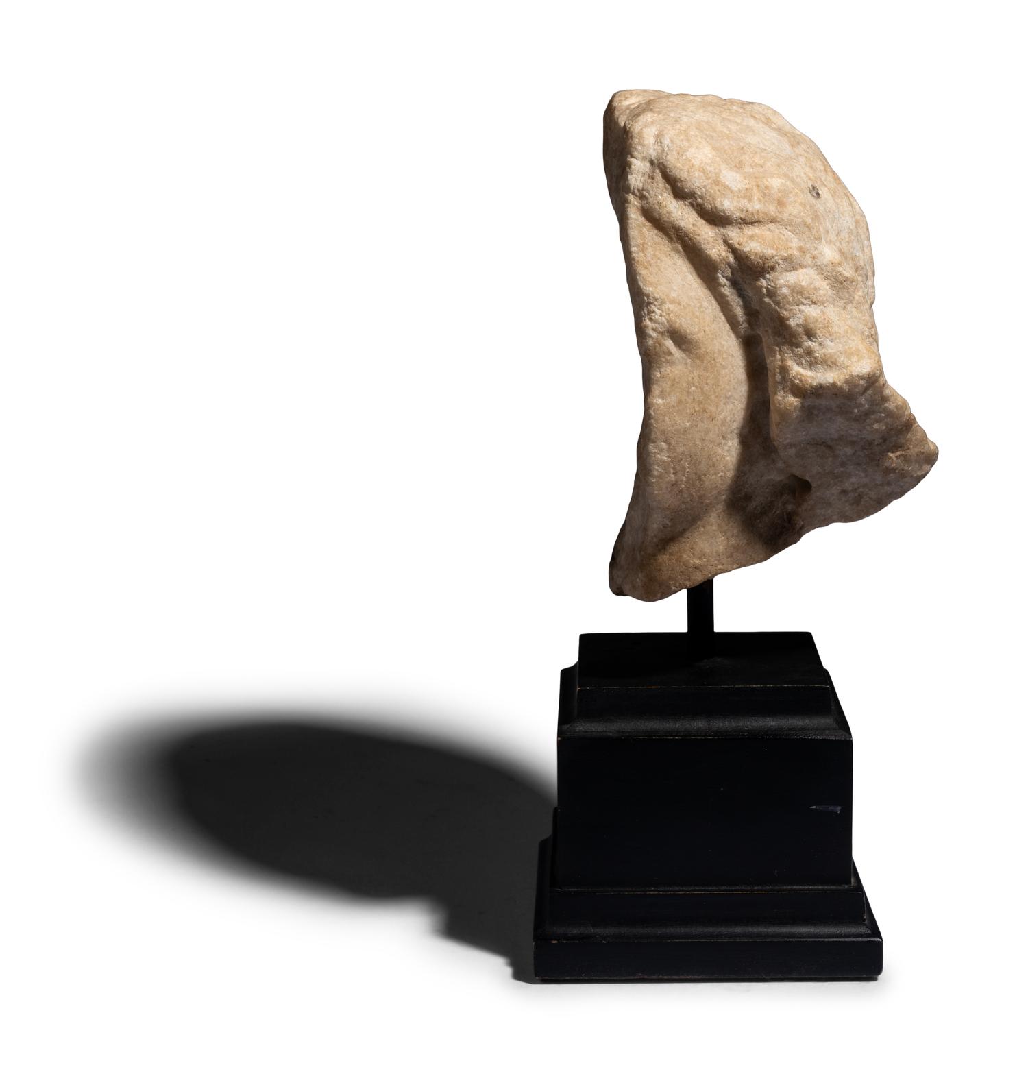 A Roman Marble Fragmentary Head of a Female