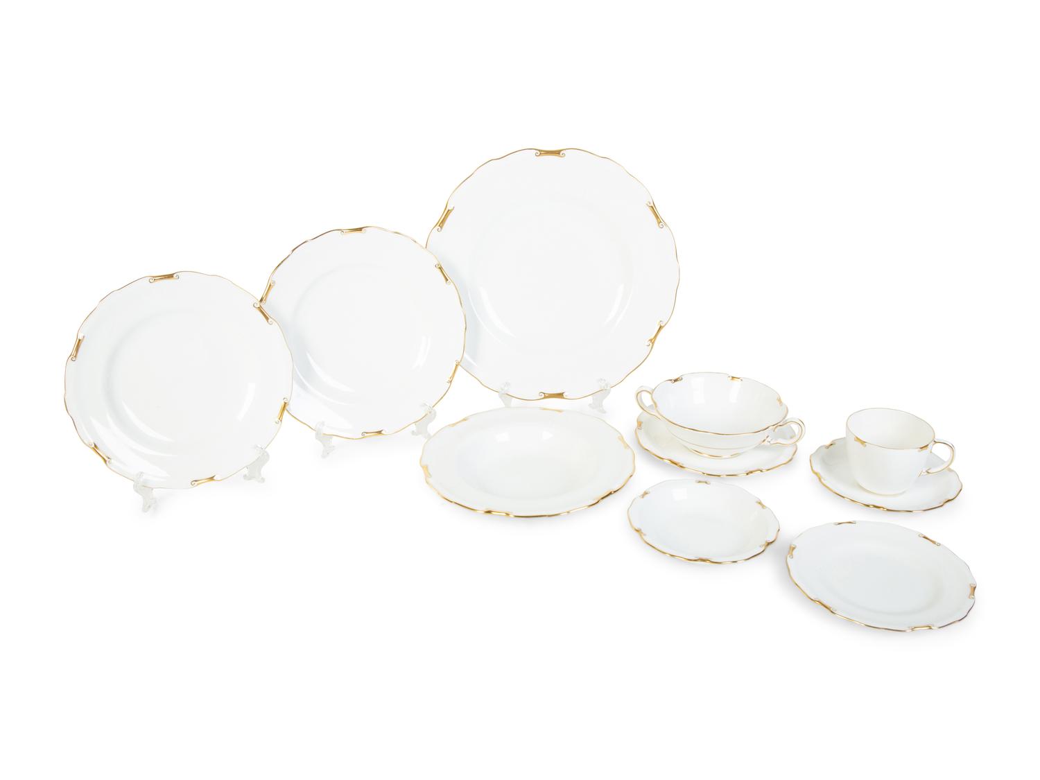 A Royal Crown Derby Porcelain Regency Pattern Dinner Service — 20TH CENTURY