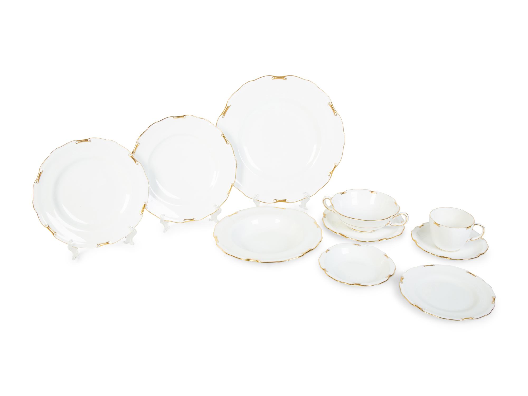 A Royal Crown Derby Porcelain Regency Pattern Dinner Service — 20TH CENTURY