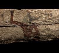 An Egyptian Painted Wood Sarcophagus Panel