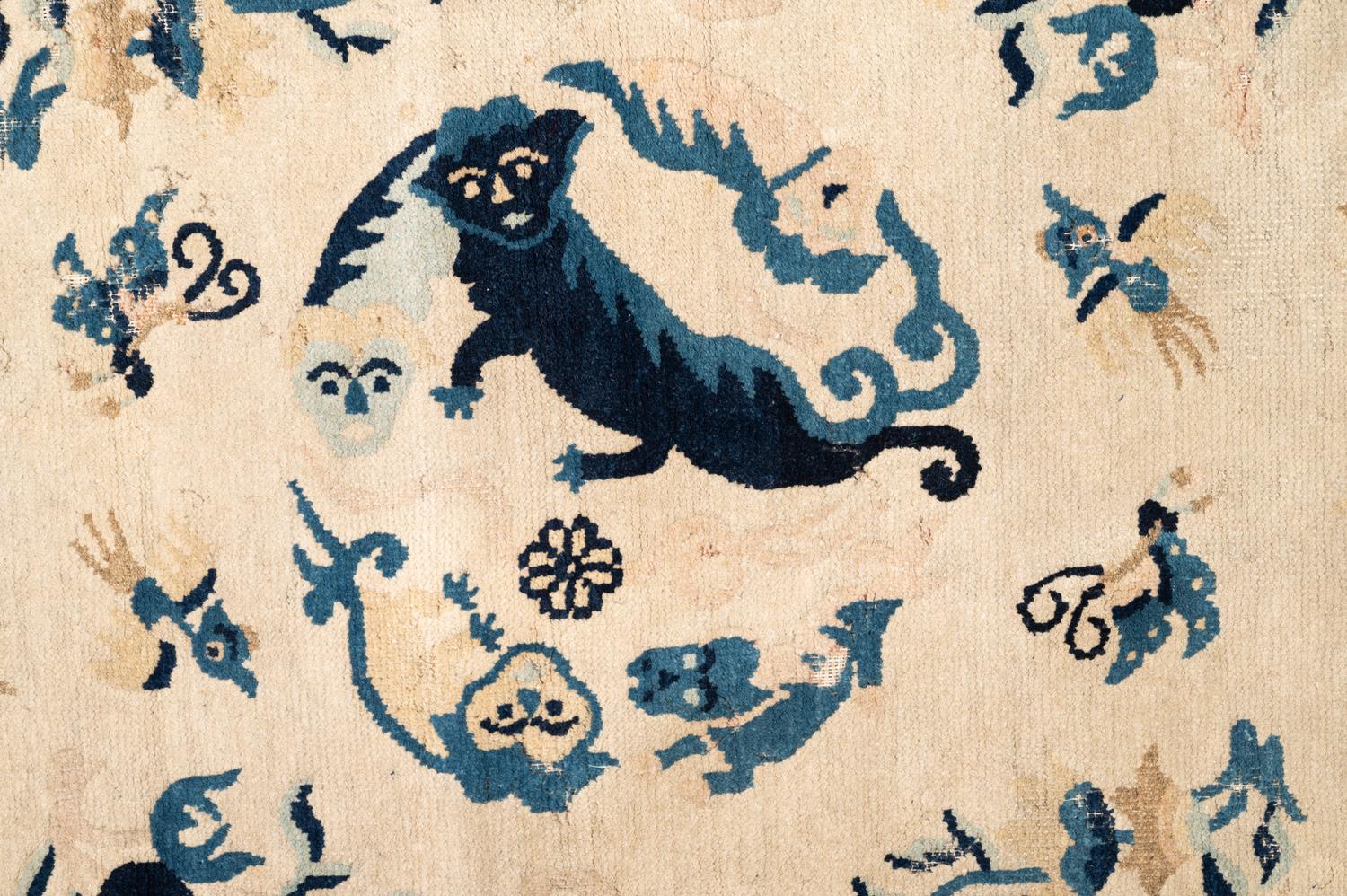 A Chinese Wool Rug with a Buddhistic Lion
