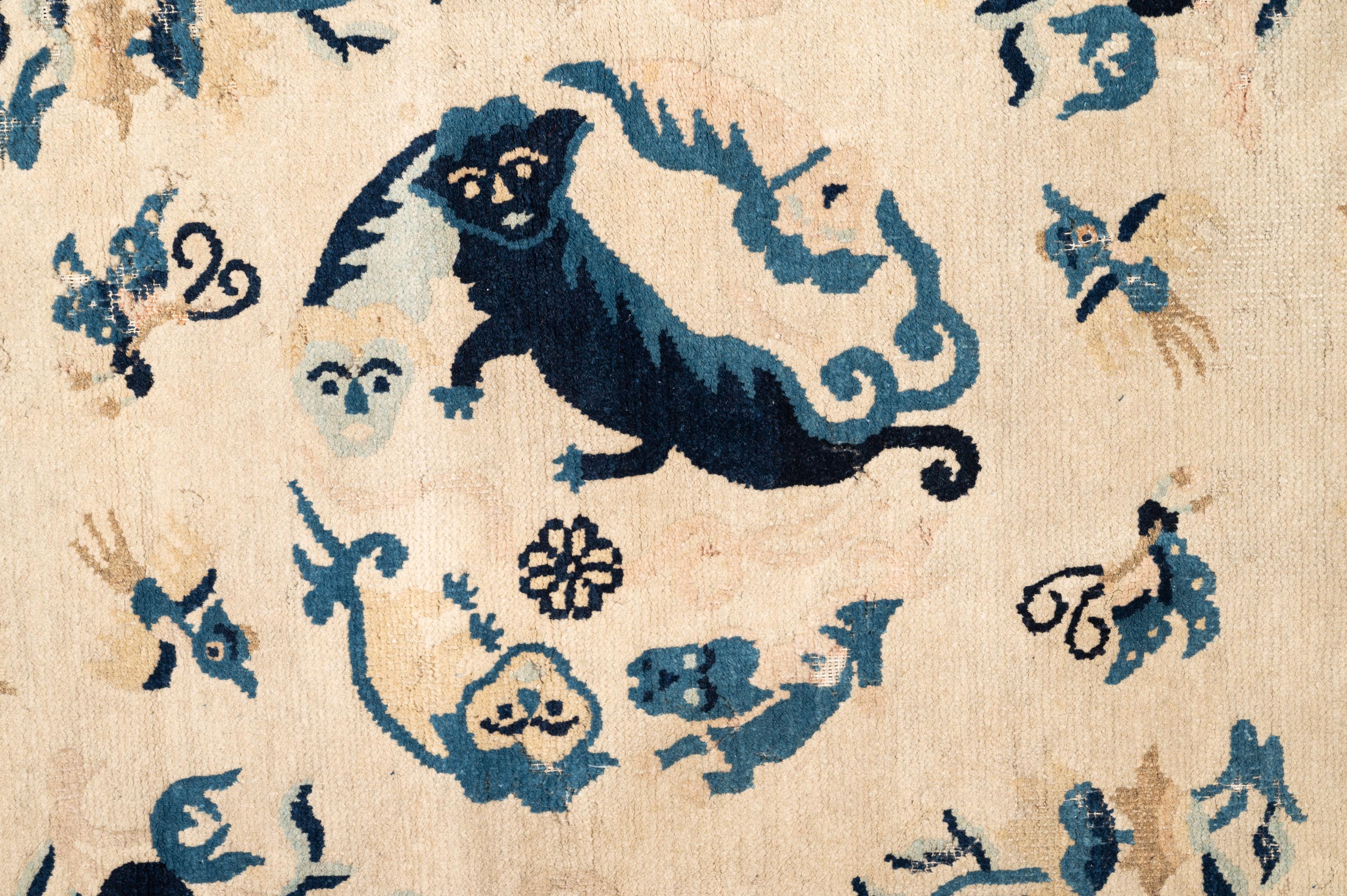 A Chinese Wool Rug with a Buddhistic Lion