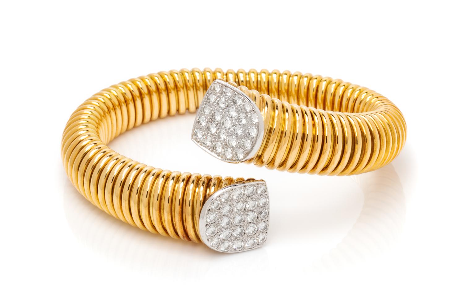 An 18 Karat Bicolor Gold and Diamond Tubogas Cuff Bracelet, Micheletto, 41.50 dwts.