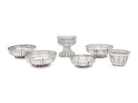 A Group of Six English Arts and Crafts Silver Table Articles