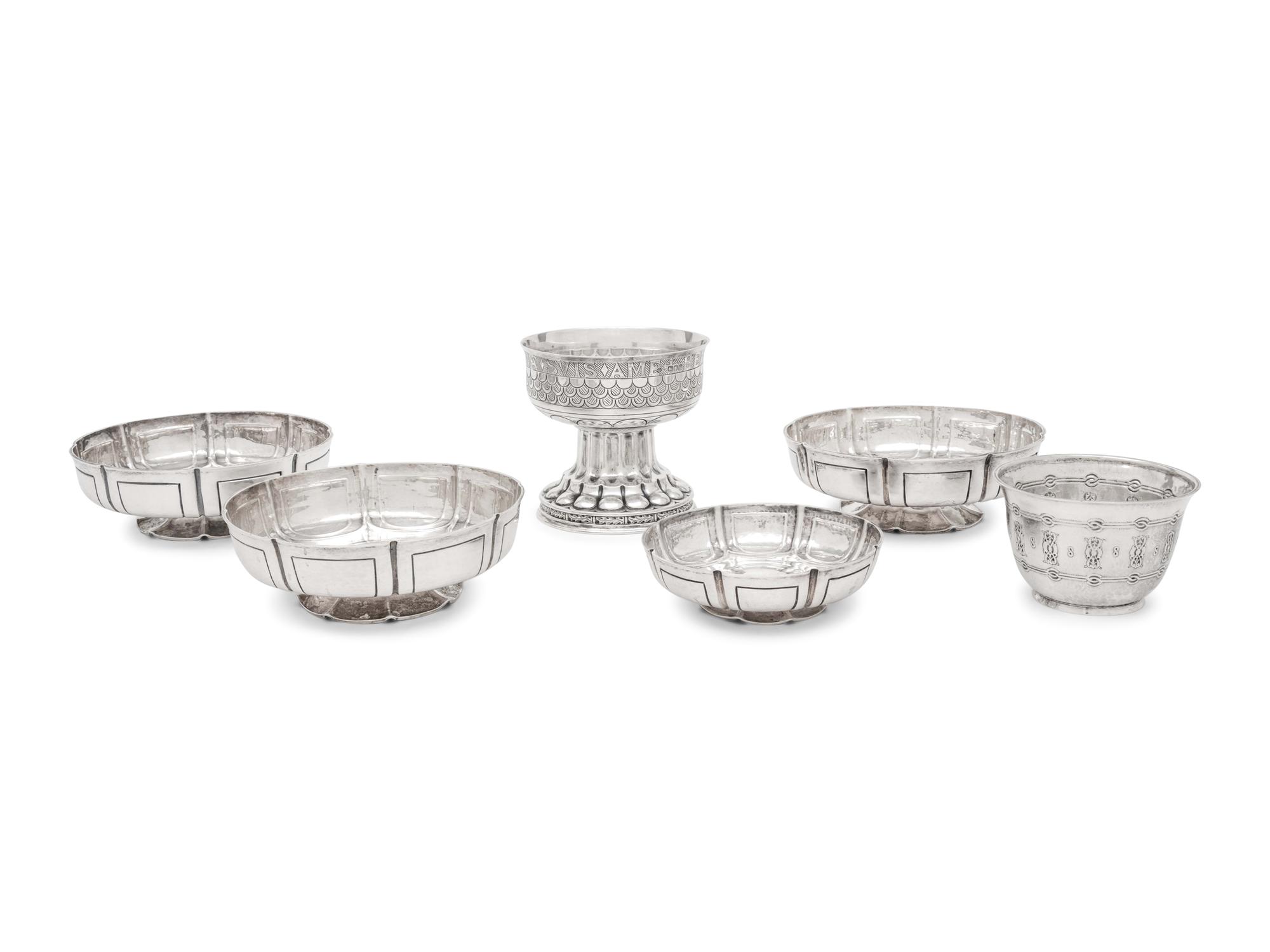 A Group of Six English Arts and Crafts Silver Table Articles