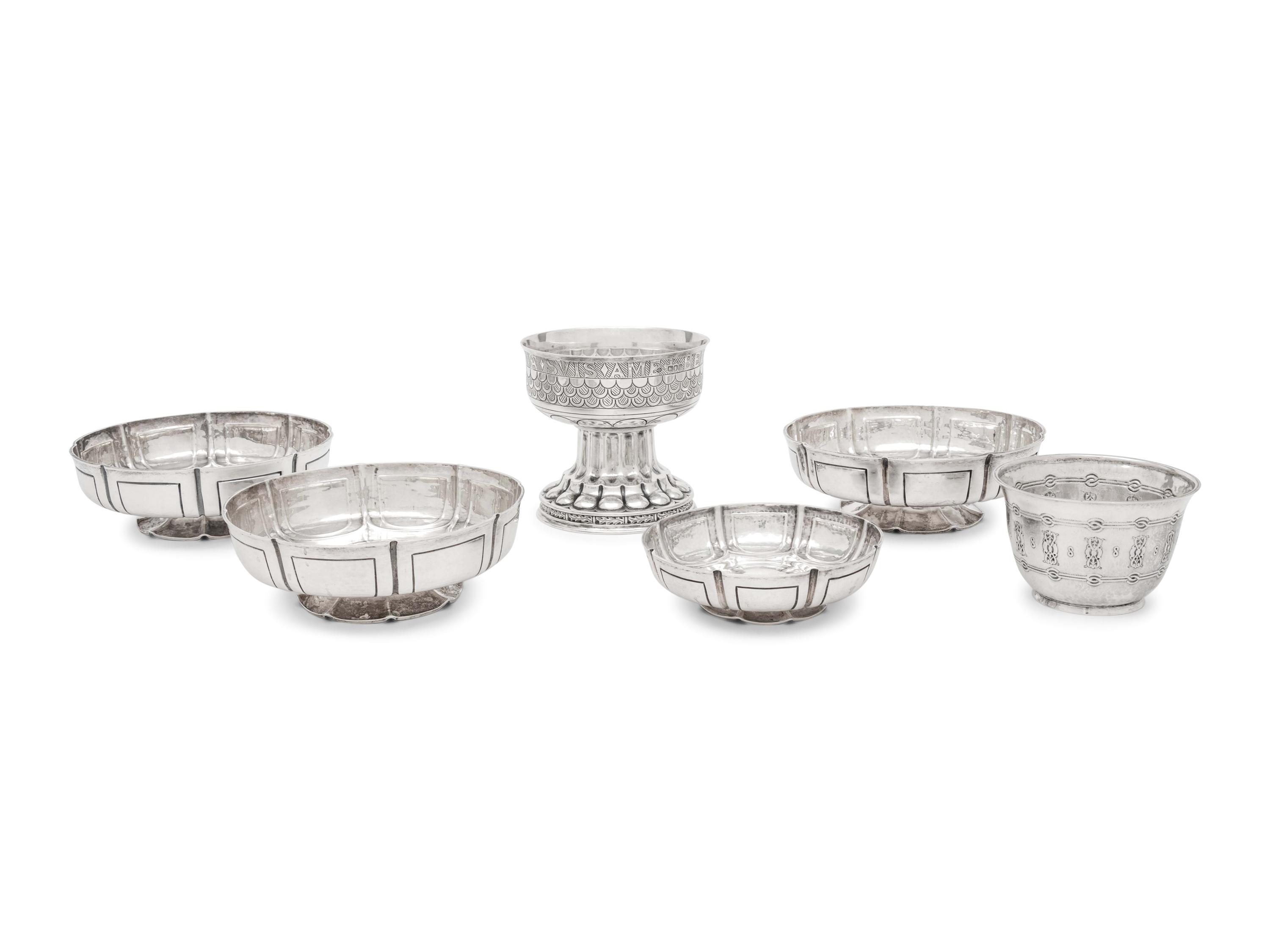 A Group of Six English Arts and Crafts Silver Table Articles