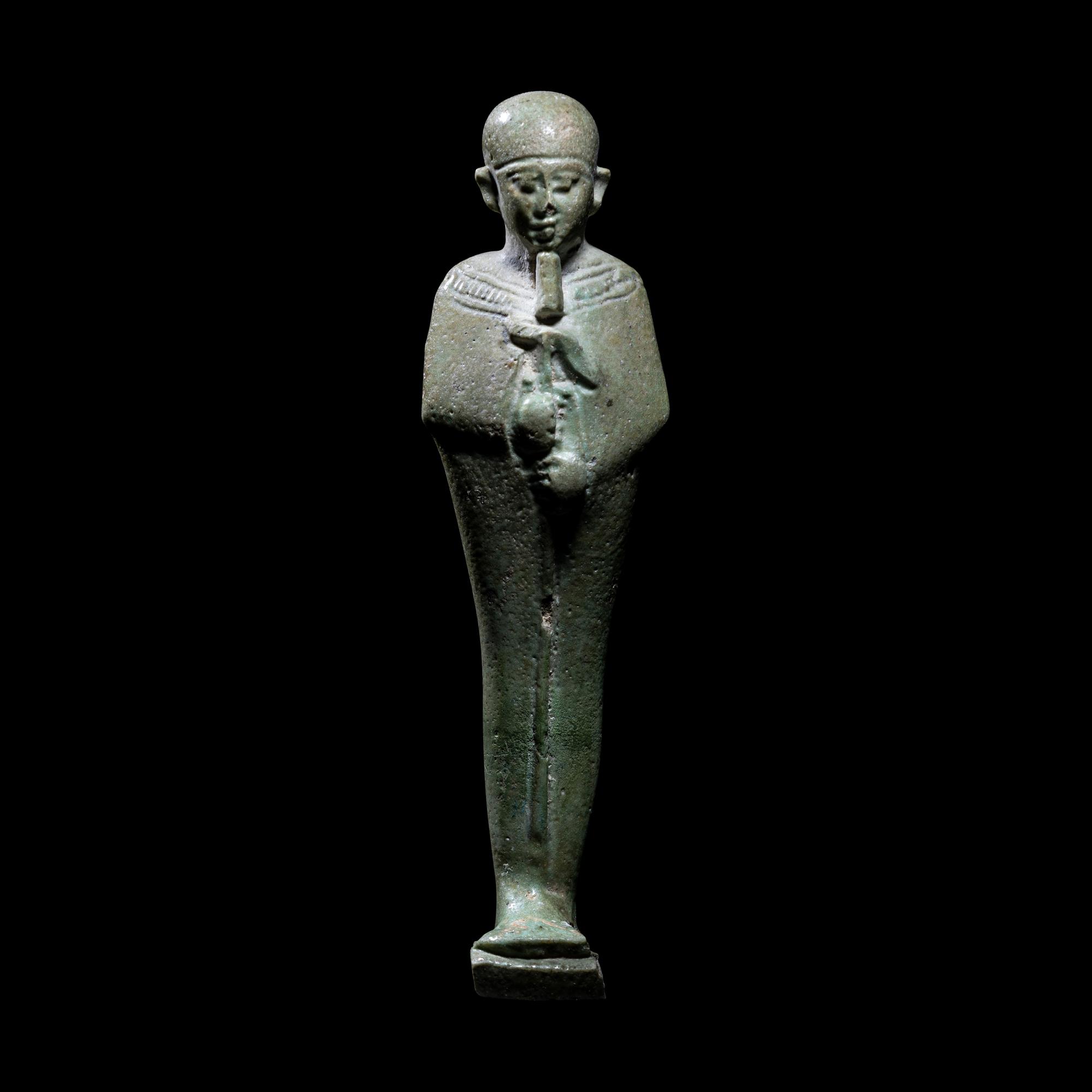 An Egyptian Faience Statuette of Ptah