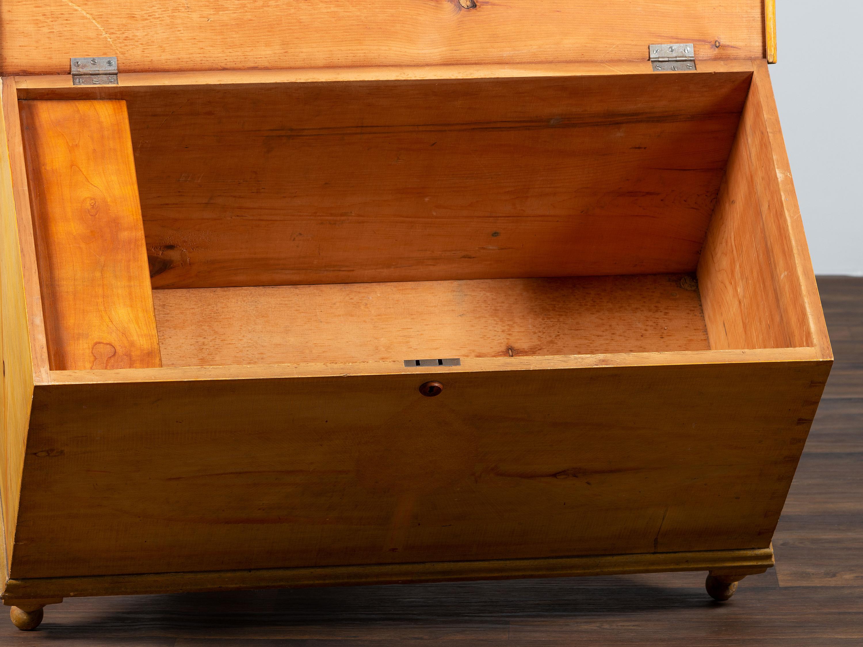 A Country Yellow and Red Paint Decorated Pine Blanket Chest