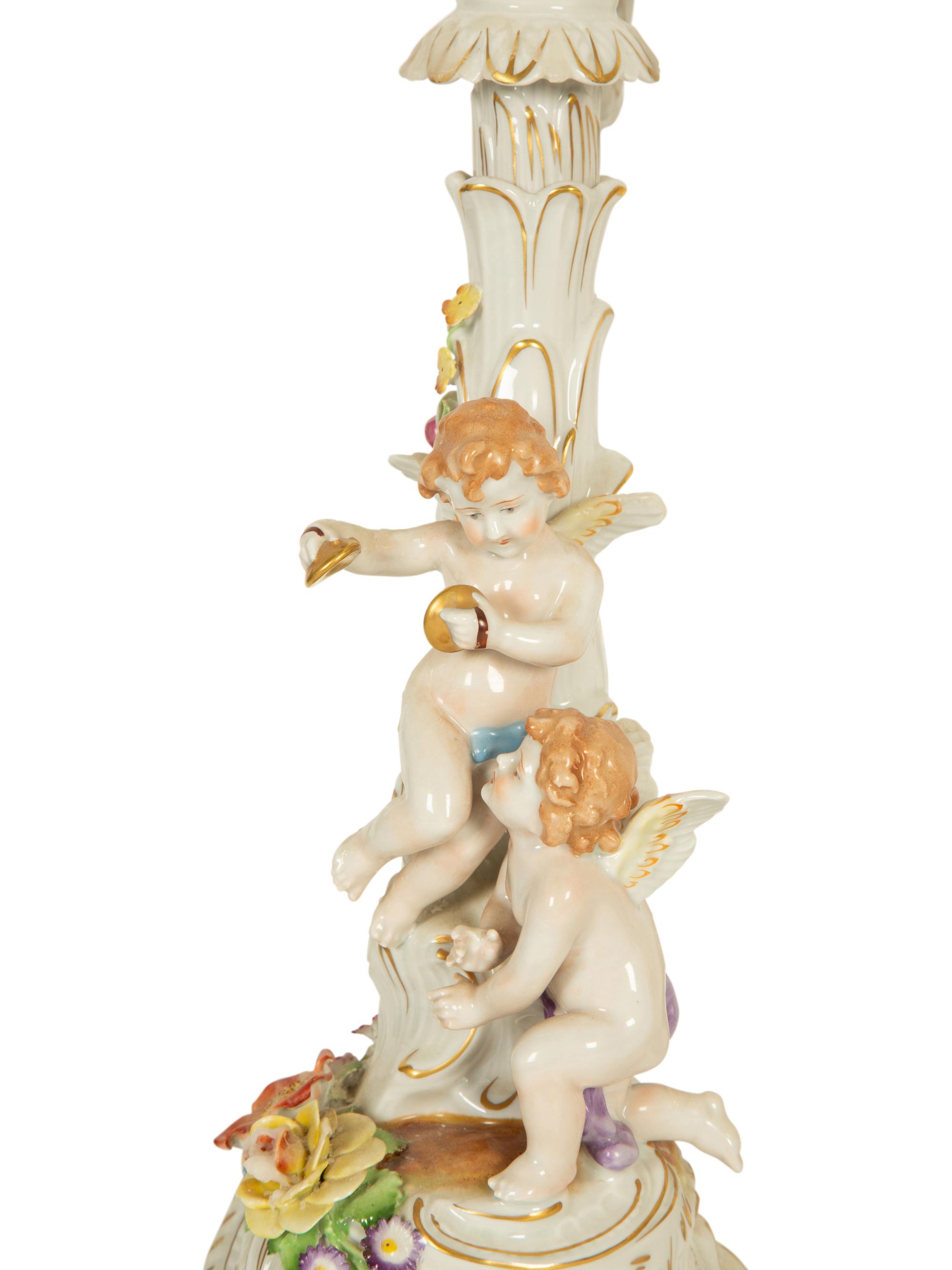 A Pair of German Porcelain Four-Light Figural Candelabras
