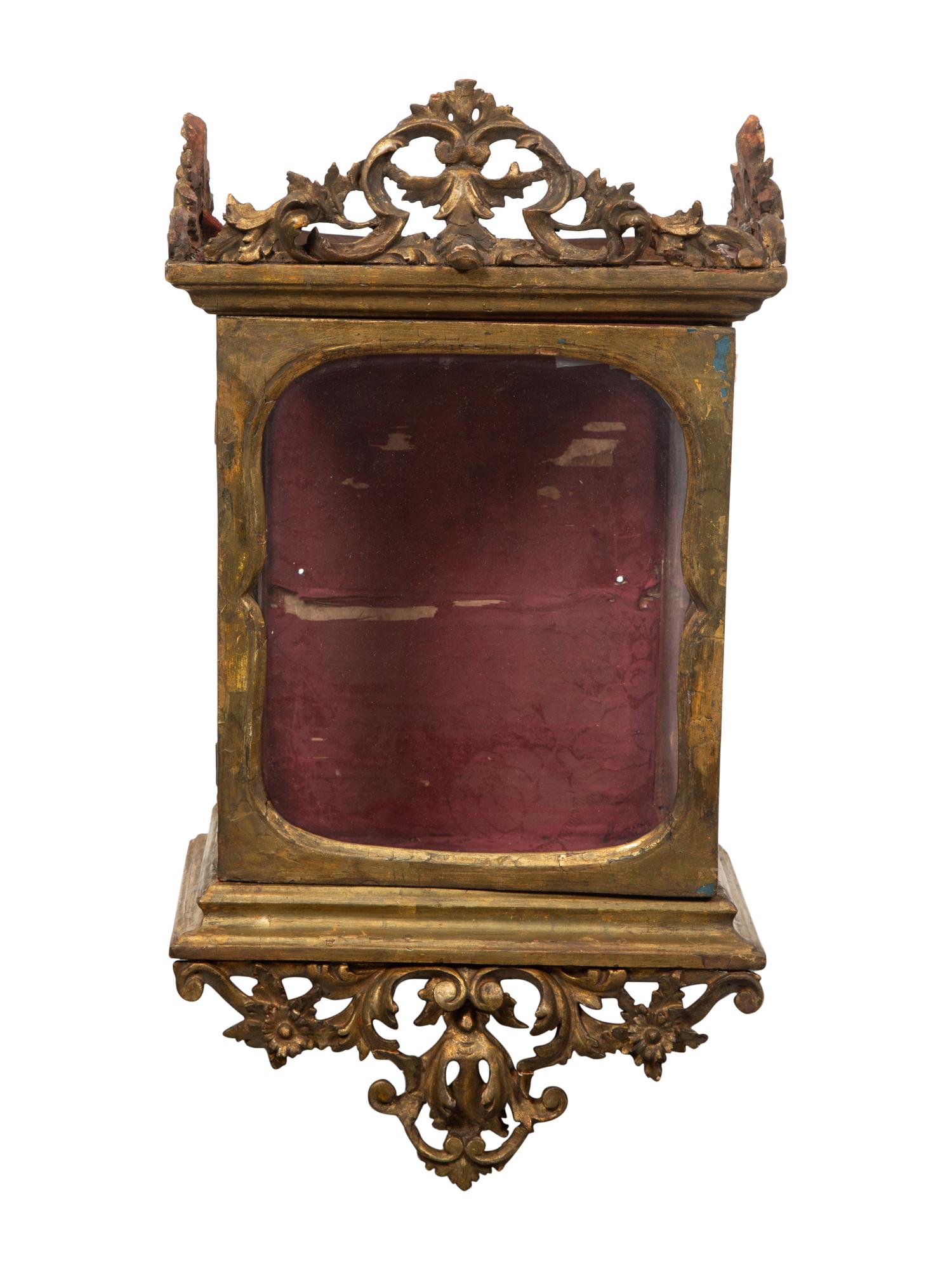 An Italian Carved Giltwood Reliquary Cabinet