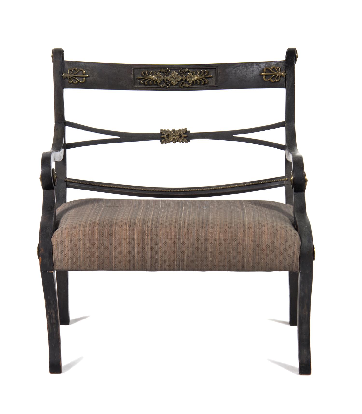 An Empire Brass Mounted Ebonized Low Armchair Height 24 inches. — EARLY 19TH CENTURY