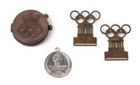 A Collection of 1936 Summer Olympic Articles Diameter of compass 1 7/8 inches.