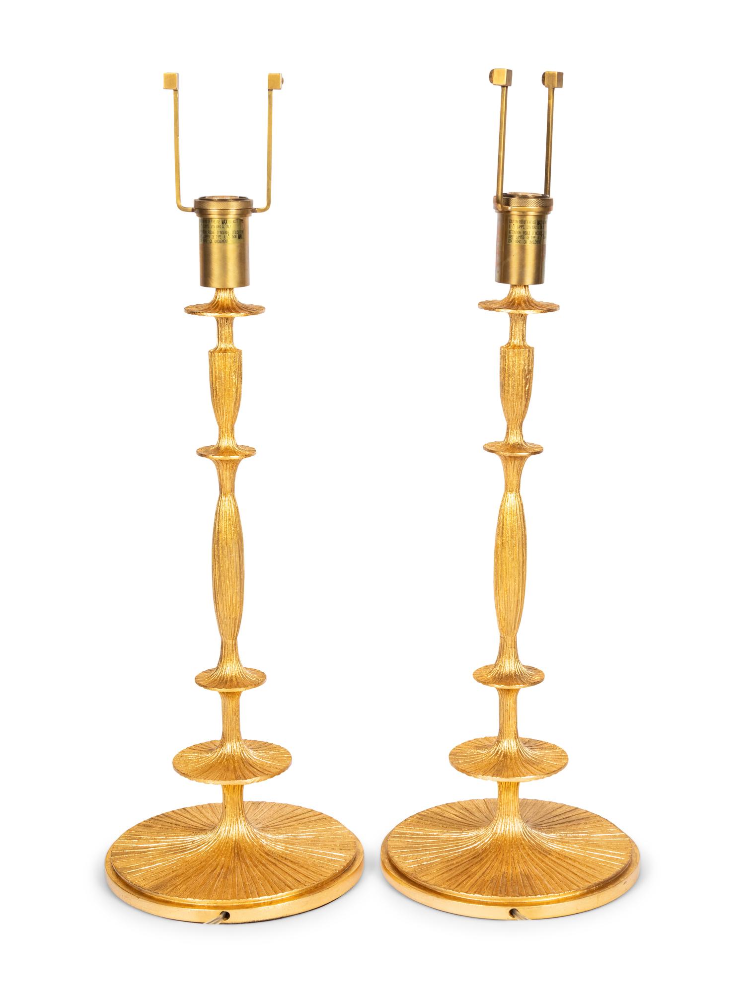 A Pair of Gilt Resin Table Lamps with Shades