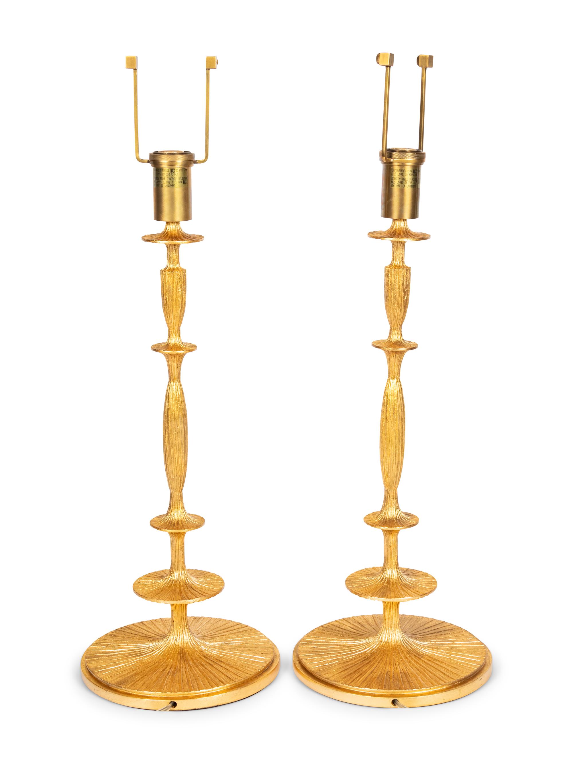 A Pair of Gilt Resin Table Lamps with Shades