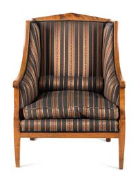 A Biedermeier Birch Armchair