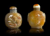 Two Carved Agate Snuff Bottles Height of taller 2 7/8 inches.