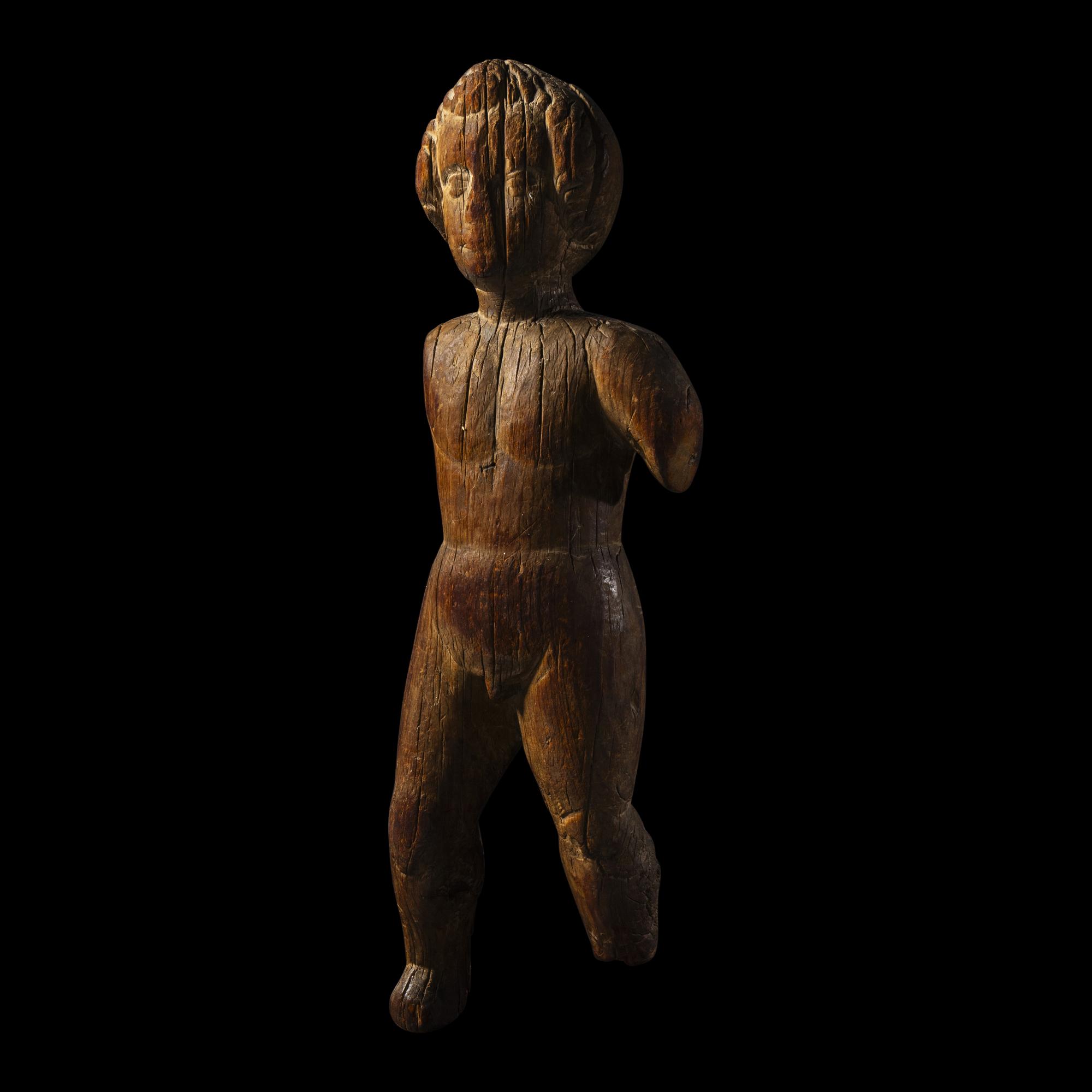 A Santo Niño Wood Figure