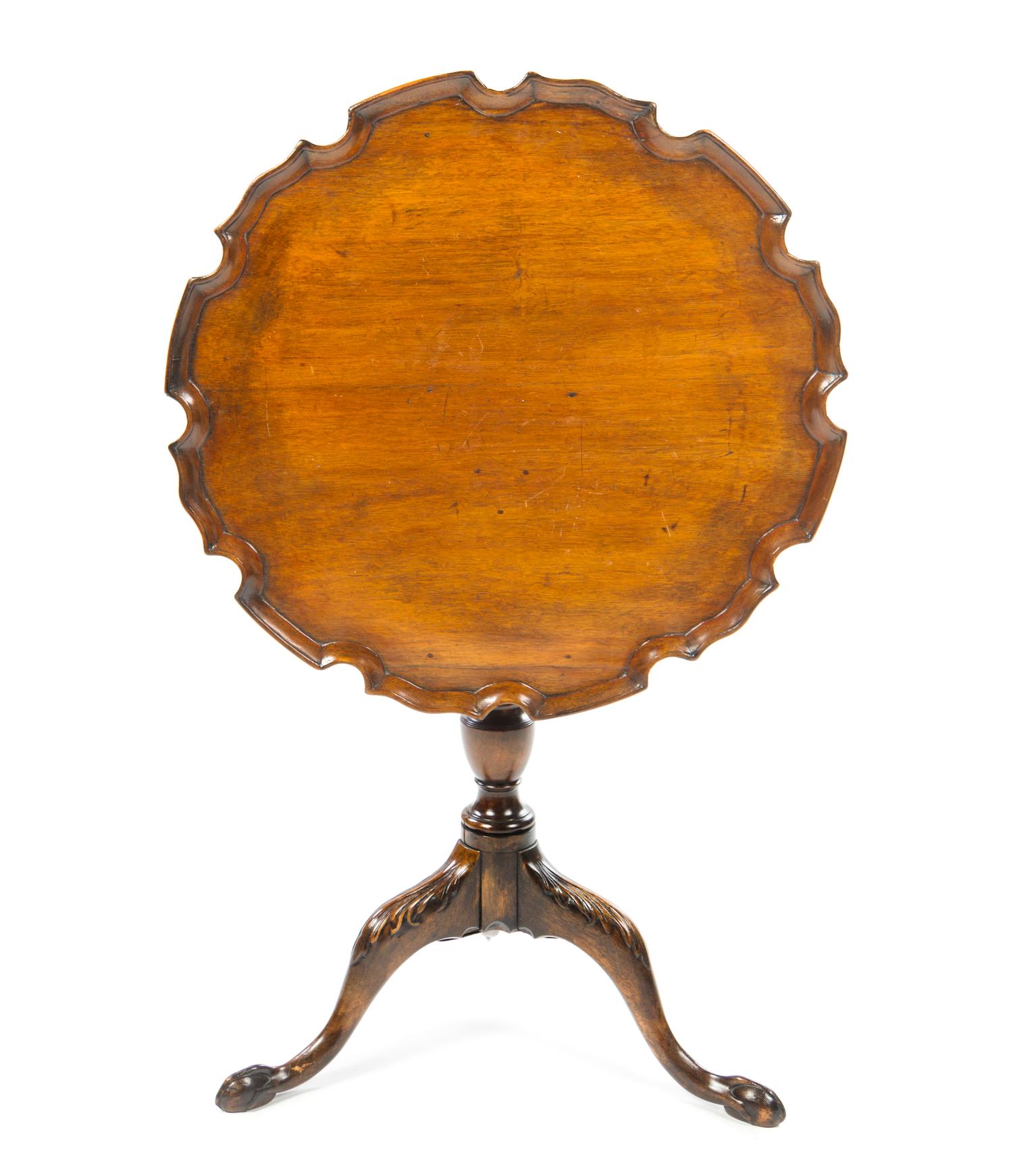 A Chippendale Style Mahogany Tilt-Top Tea Table Height 27 1/2 x diameter of top 26 inches. — 19TH CENTURY