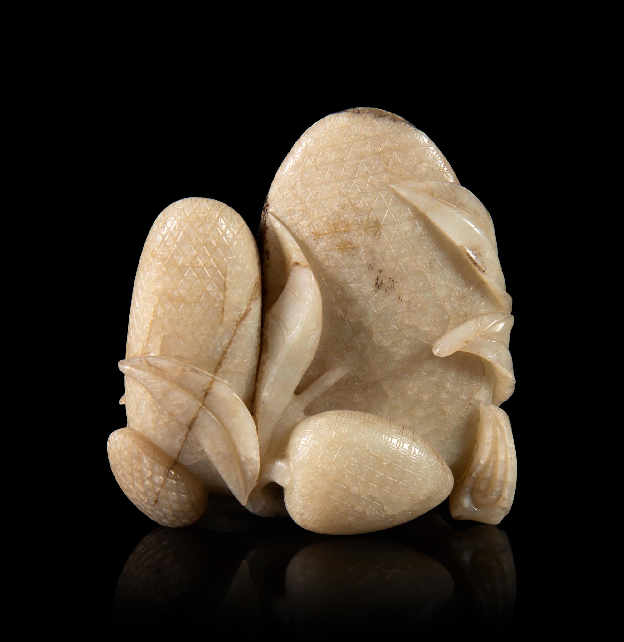 A Chicken Bone Jade Carving of Fruits