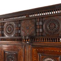 A Breton Carved Walnut Cabinet
