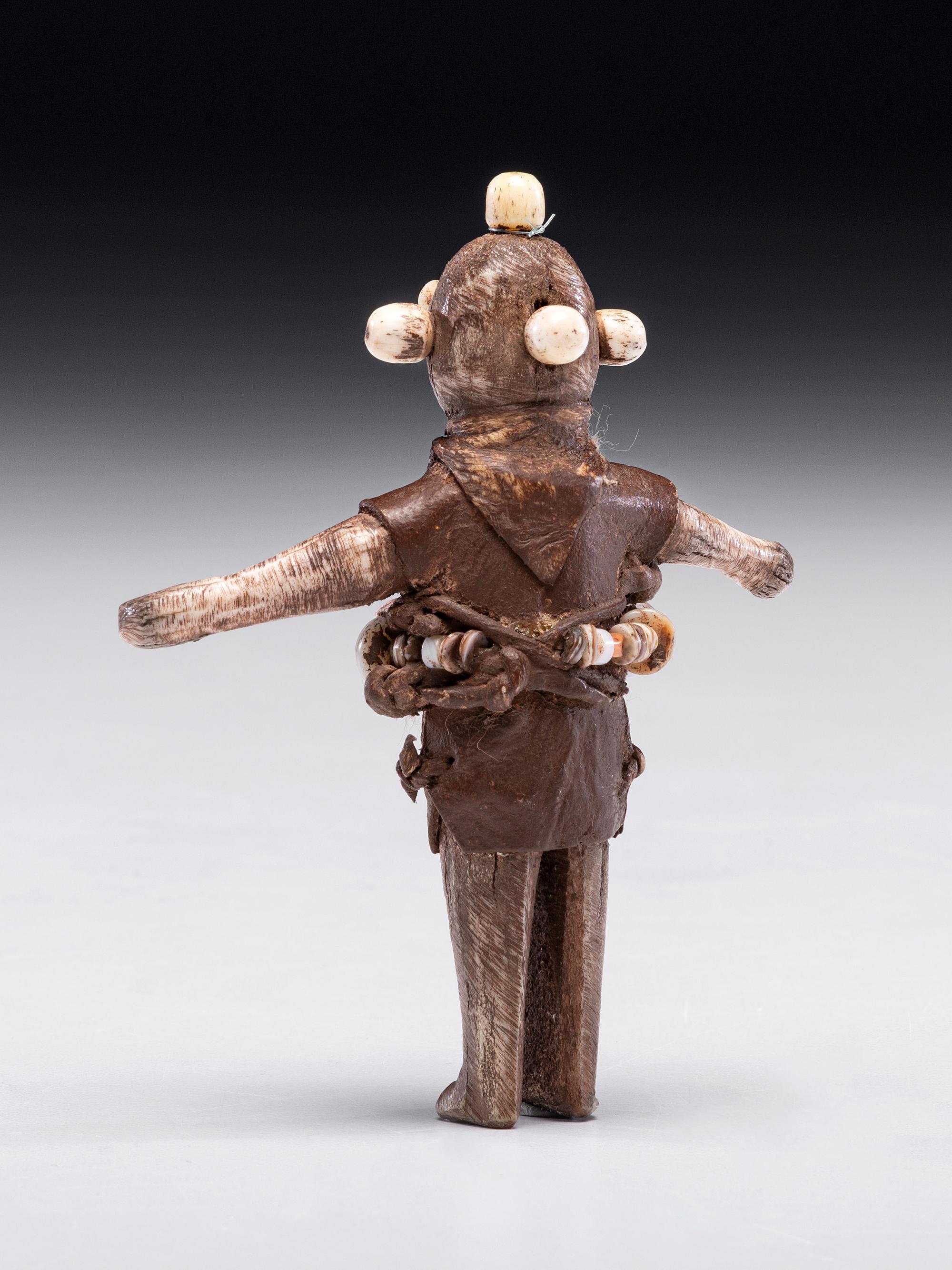 Carved Bone Figure, Mudhead
