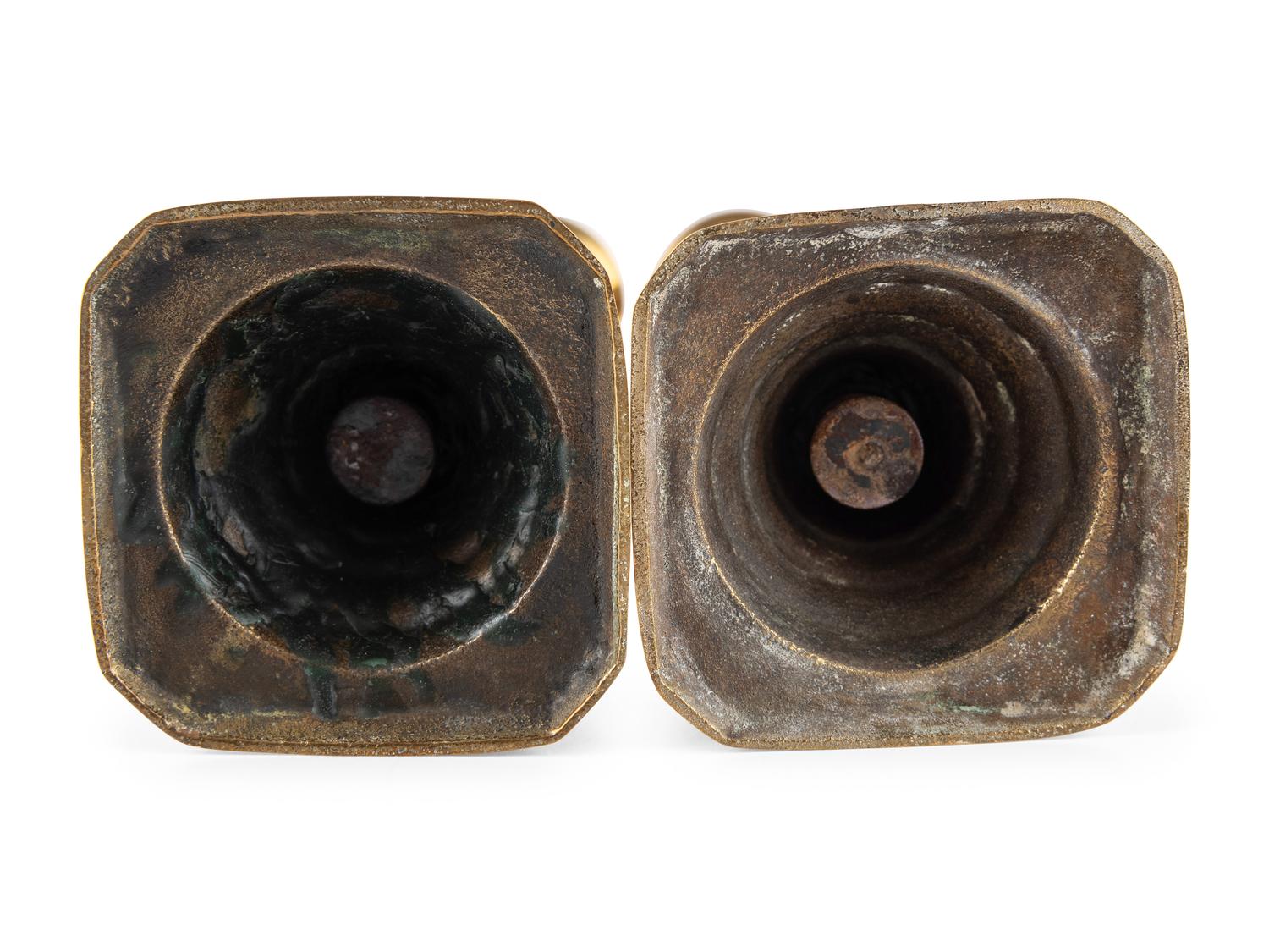 A Group of Brass Candlesticks
