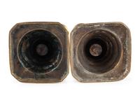 A Group of Brass Candlesticks
