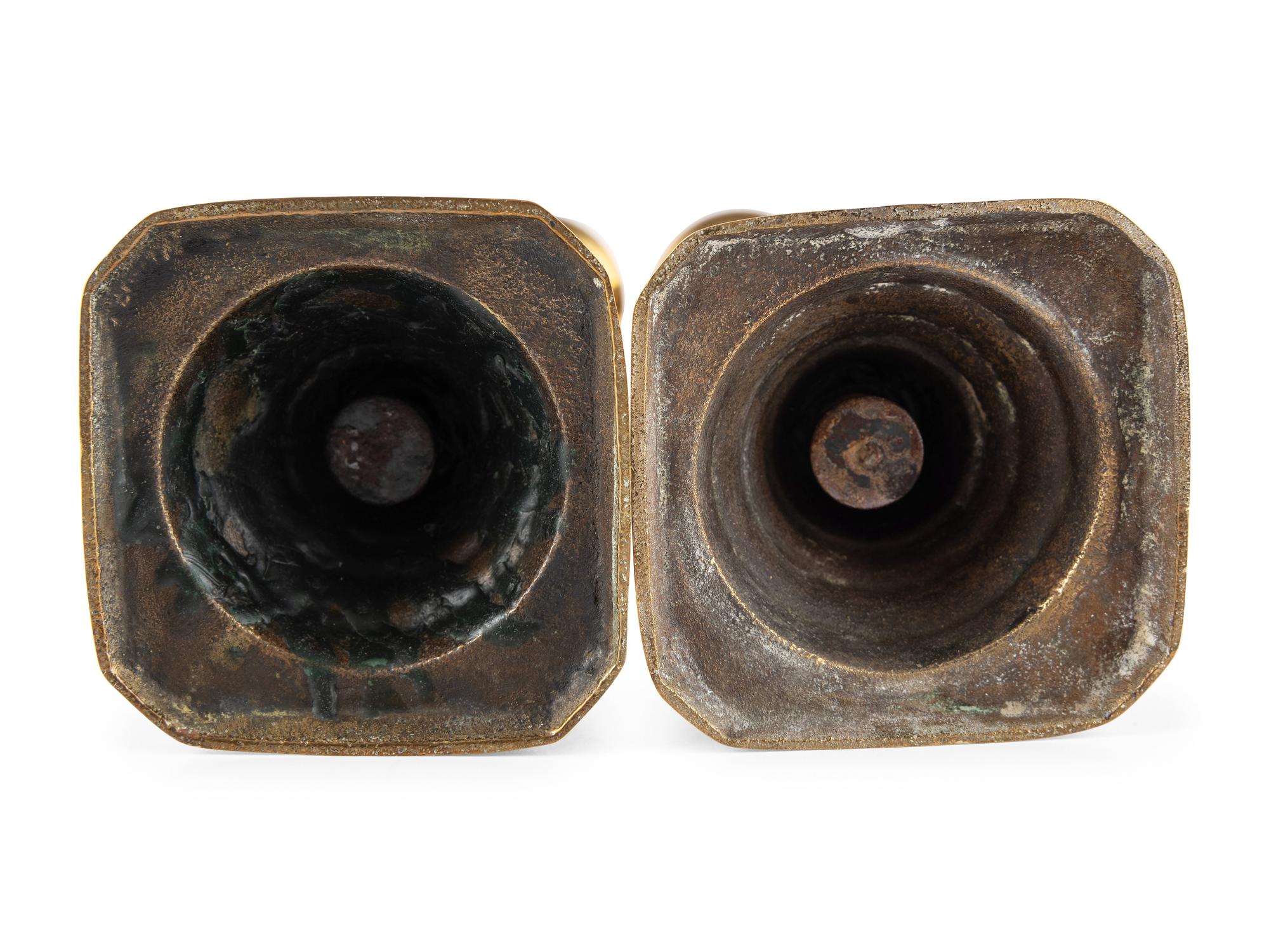 A Group of Brass Candlesticks